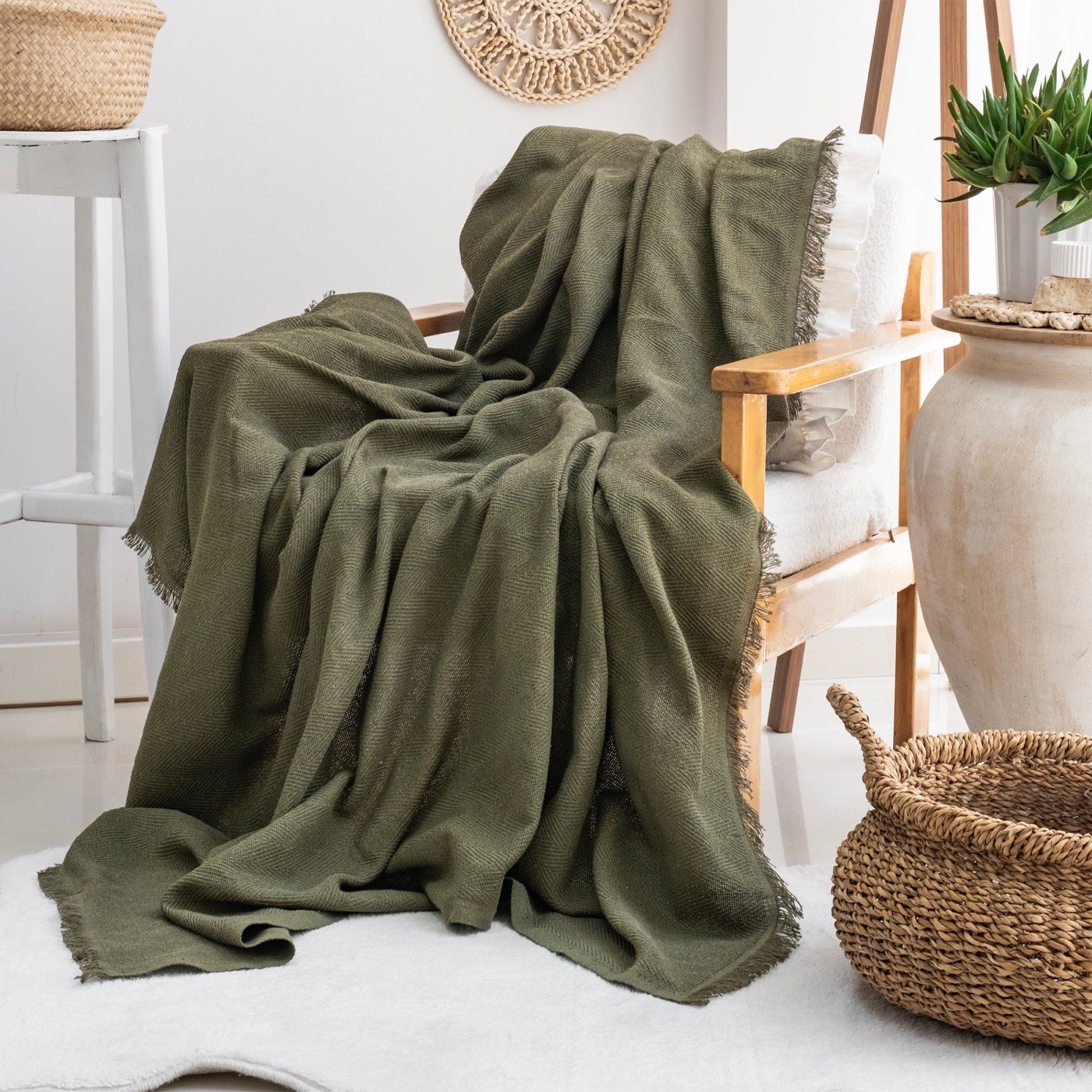 Milam London herringbone throw styled on an armchair